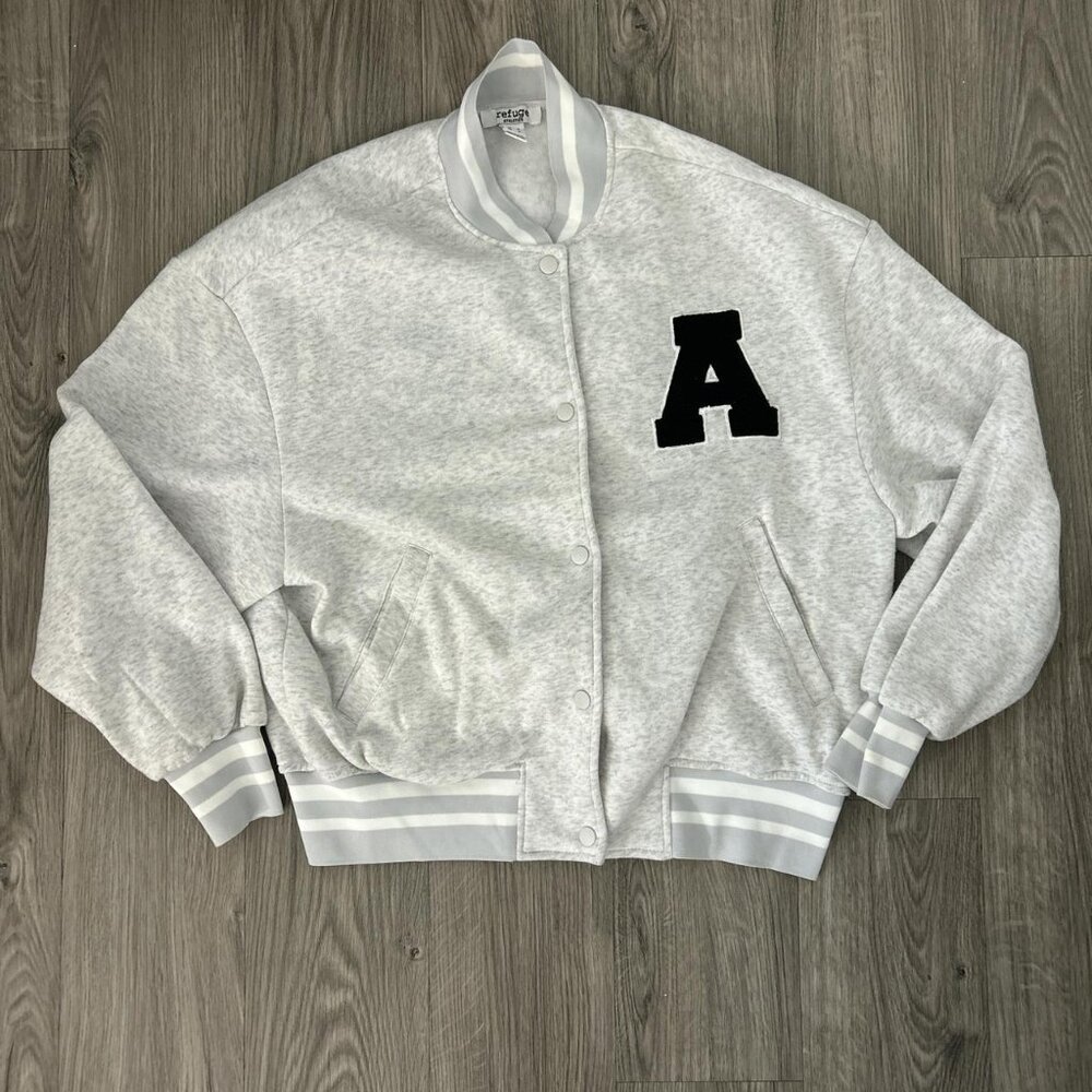 Grey and black varsity jacket #varsityjacket